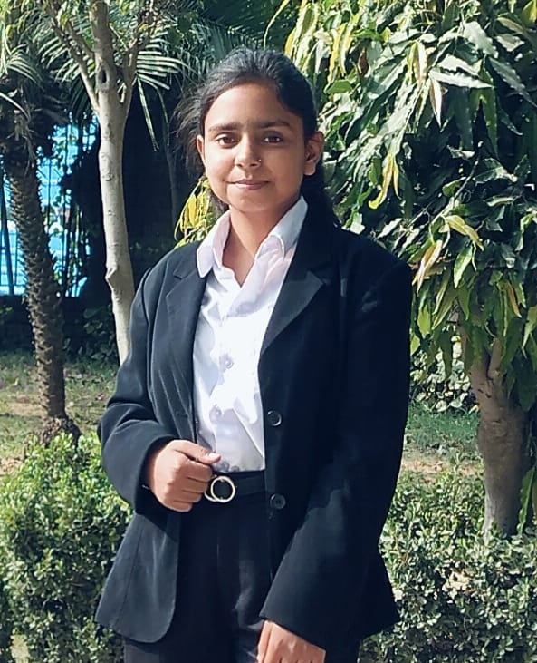 A professional headshot of Sanchi Chauhan